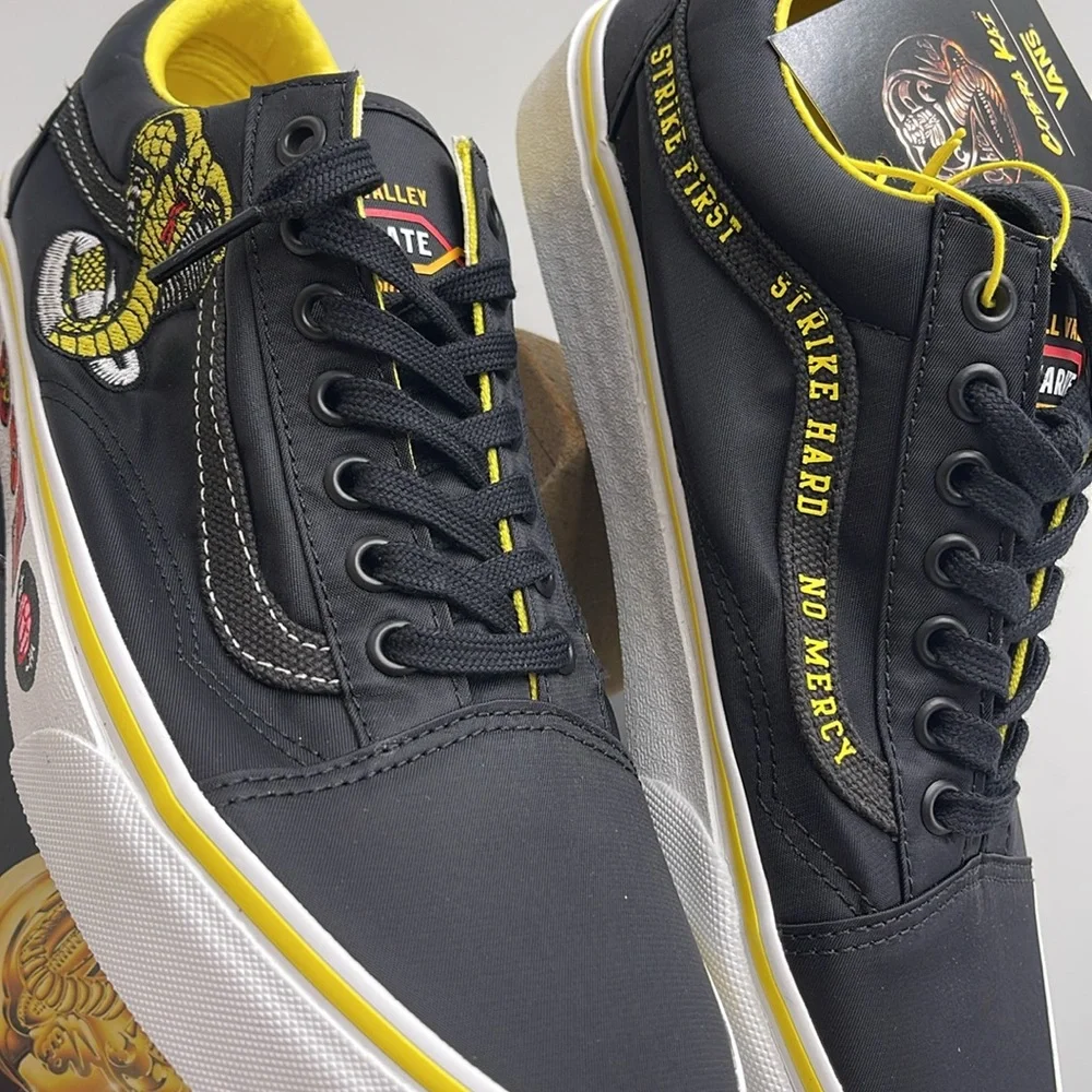 Vans Men’s Old Skool
Cobra Kai Black/Yellow/White 
VN0A3WKT05N
Sneakers - Picture 7 of 16